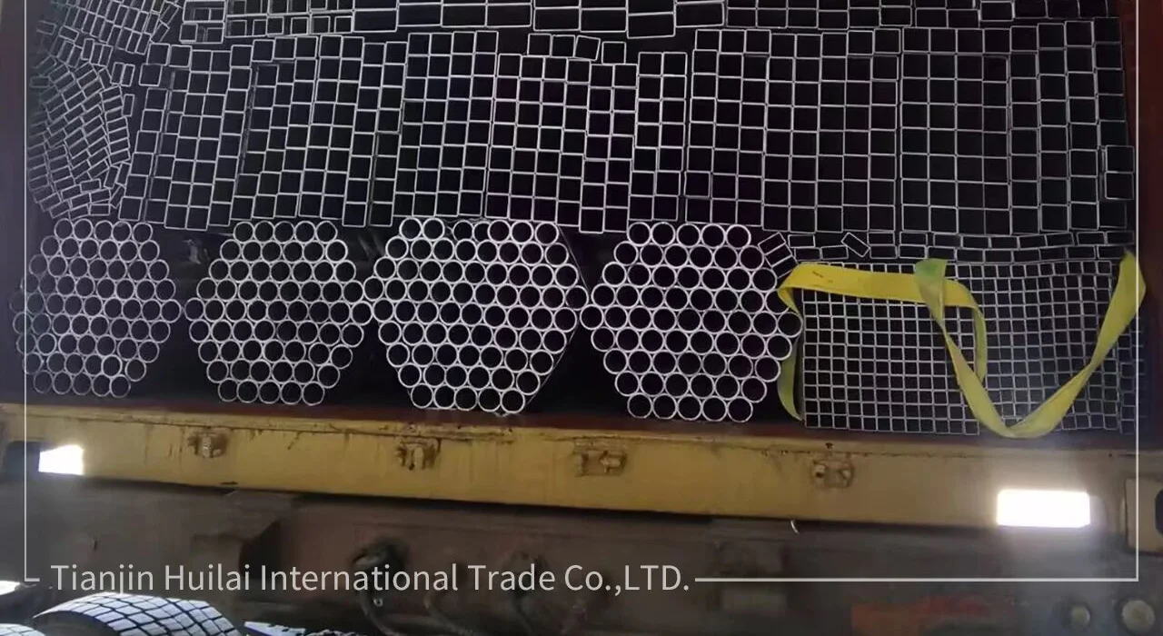 Detail of pre-galvanized round tube bundles loaded below rectangular tubes