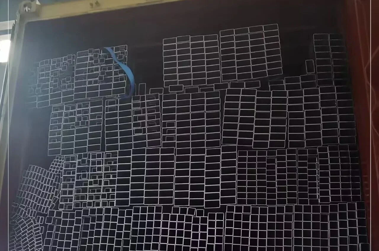 Detail of pre-galvanized square and rectangular tube ends stacked in a container