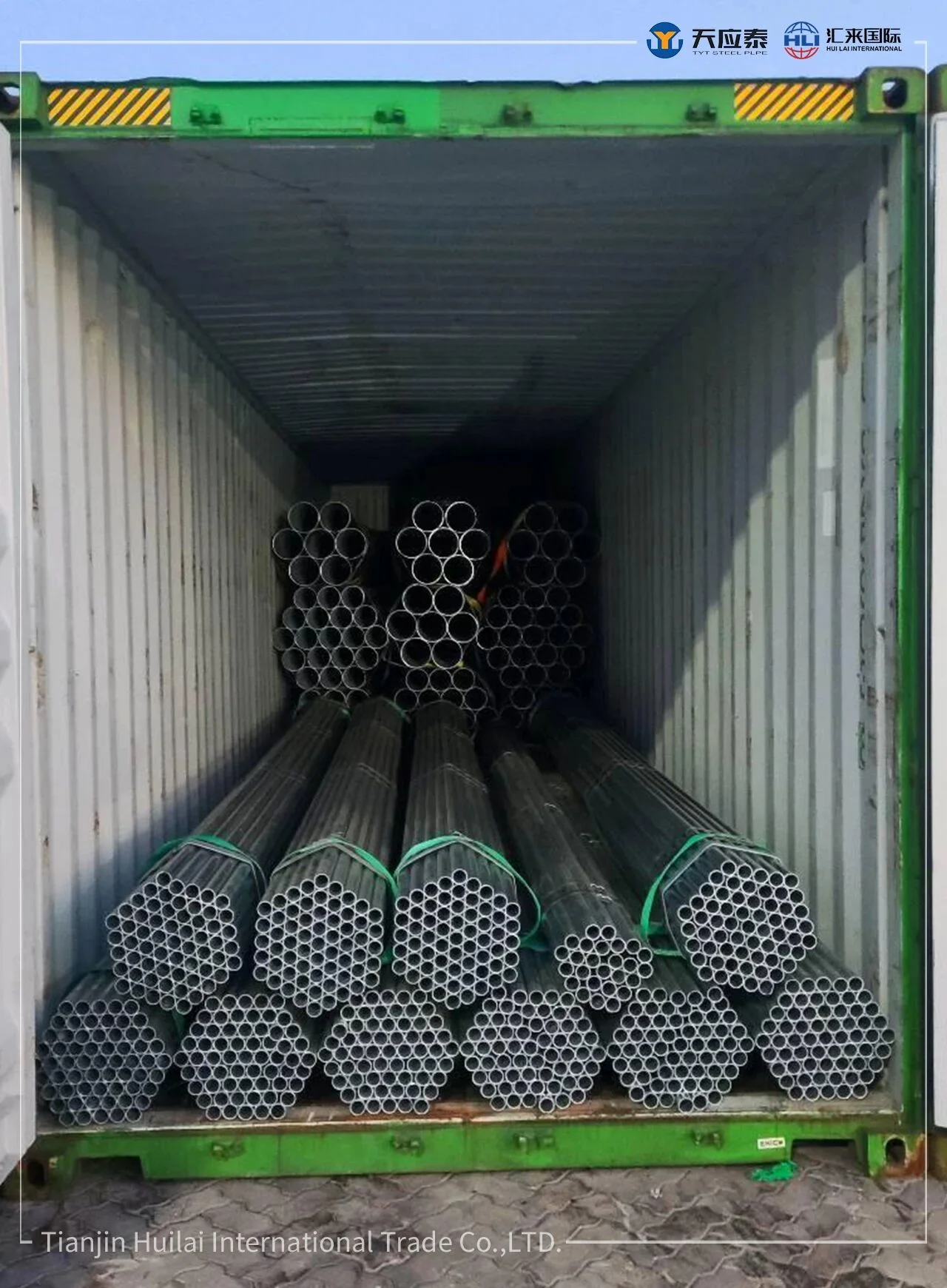 Bundles of Q235 round steel pipes loaded inside a shipping container